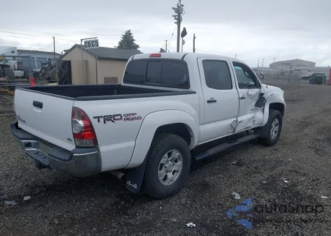 2015 Toyota Tacoma Base V6 z USA, uszkodzony, nr VIN 3TMLU4EN8FM206394